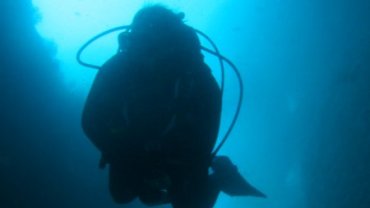 Jo Silhouetted against tunnel opening